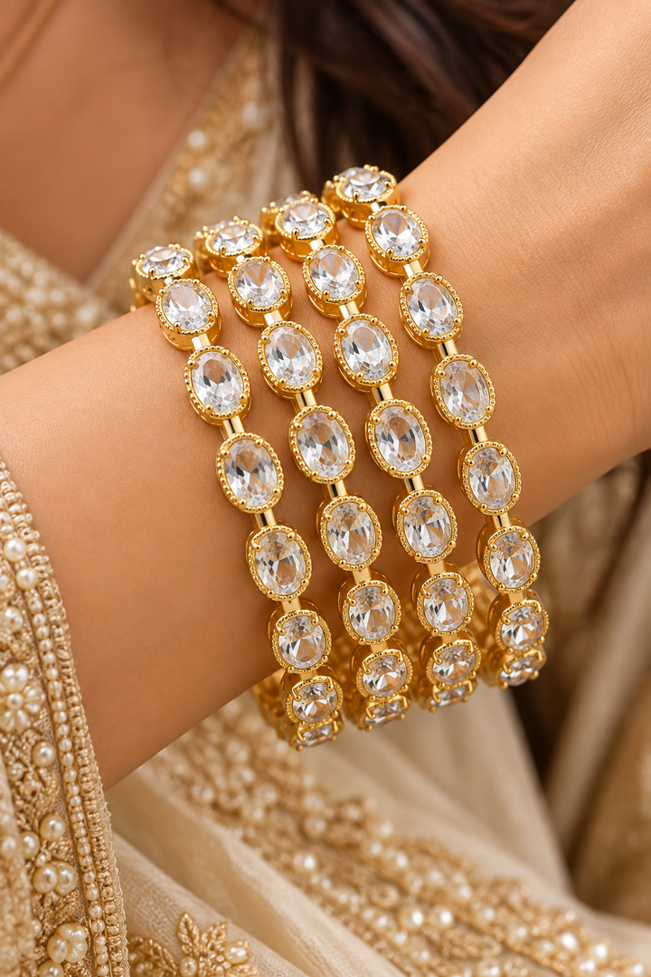 Oval Solitaire CZ Gold Bangle Set of 4