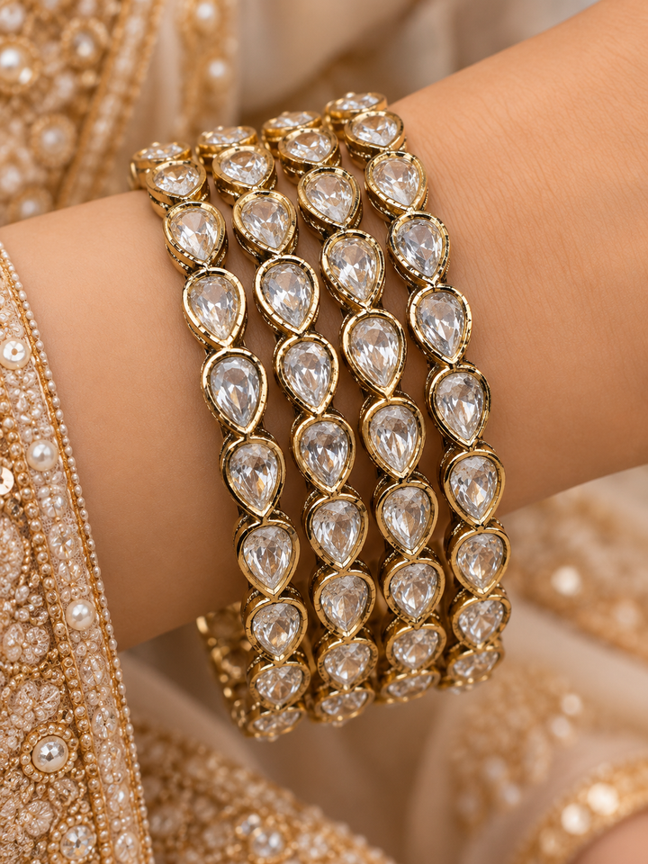 Set of 4 Gold Tone Teardrop Crystal Bangles for Women Party Wear Style