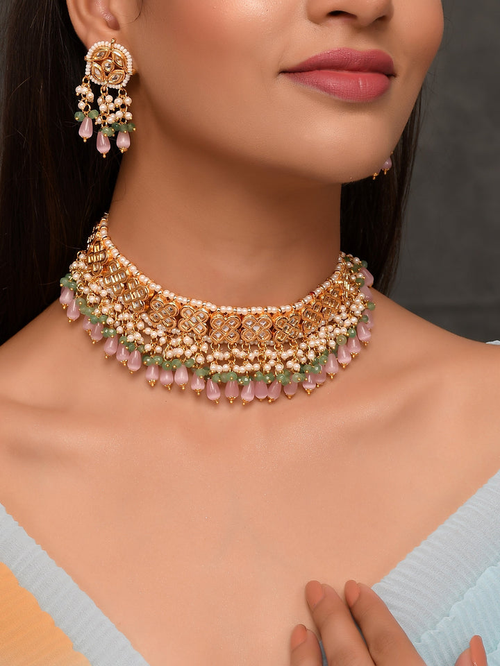 Dastoor Gold-Plated Peach Kundan Studded Jewellery Set