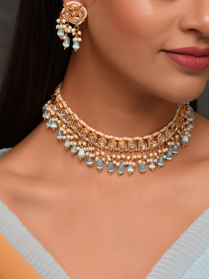 Dastoor Gold-Plated Blue Kundan Studded Jewellery Set