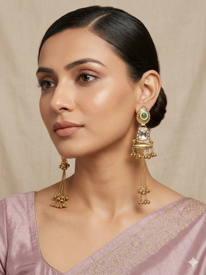 Emerald Stone Kashmiri Earrings with Antique Gold Tassel Chains and Traditional Pearl Detailing for Festive Royal Ethnic Elegance