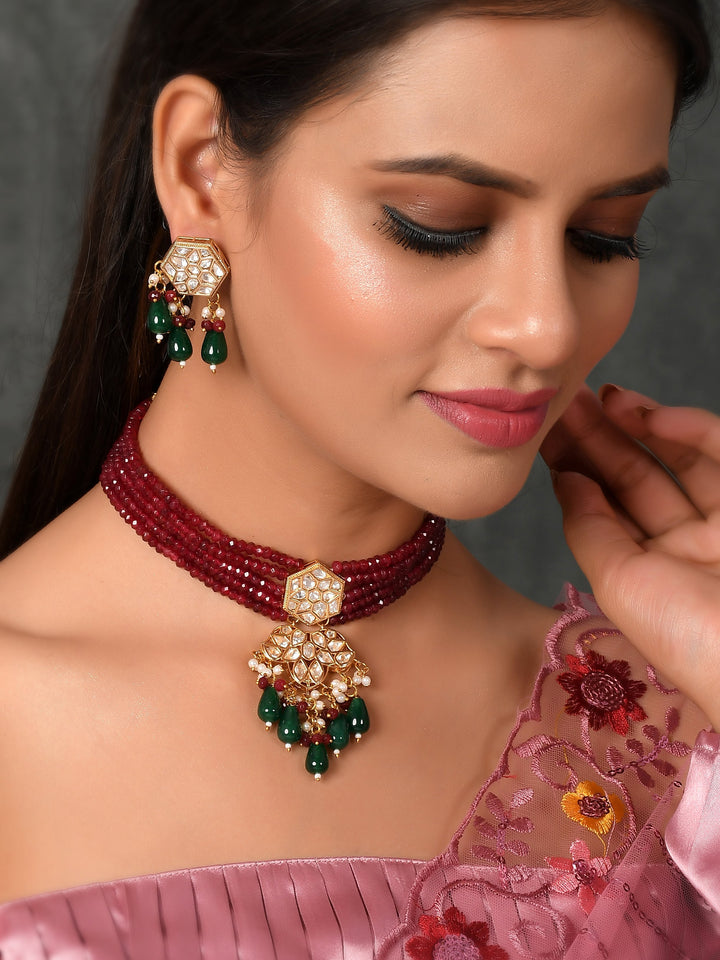 Dastoor Women Gold-Plated Red Kundan-Studded Jewellery Set
