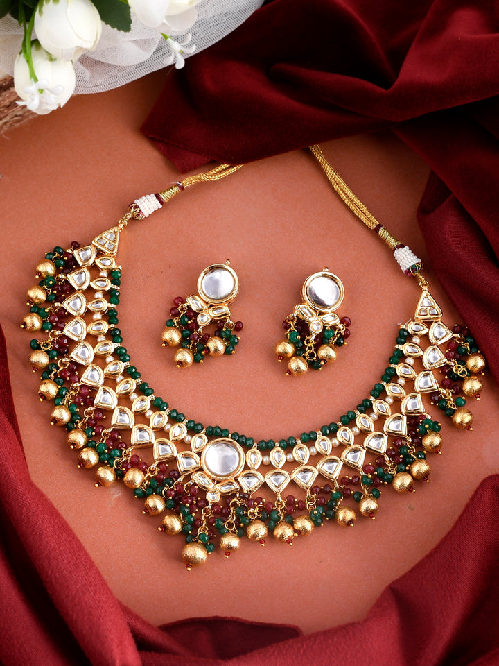 Dastoor Gold-Plated Red Green Kundan Studded Jewellery Set