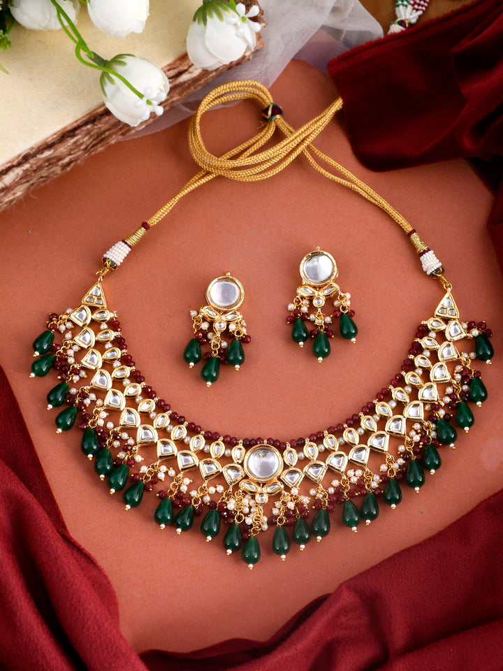 Dastoor  Gold-Plated Red  White Kundan Studded Jewellery Set